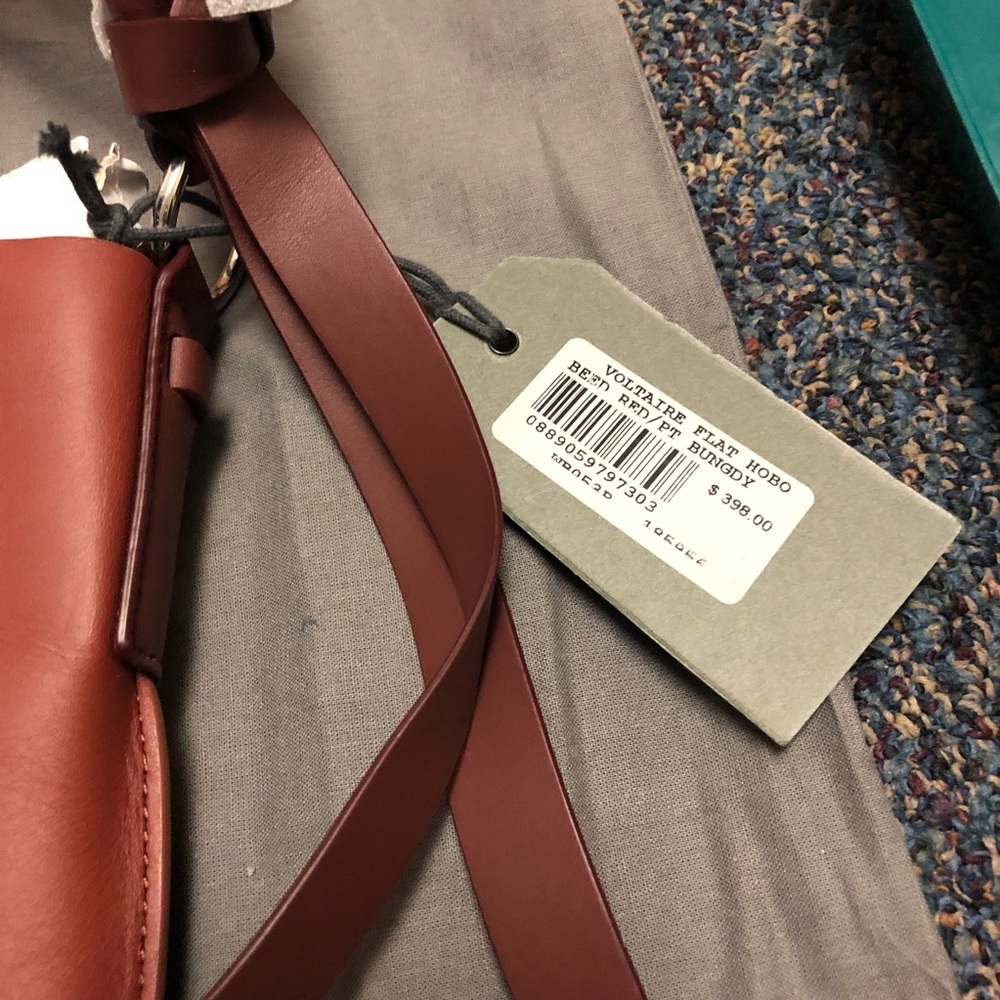 All saints Voltaire flat hobo bag